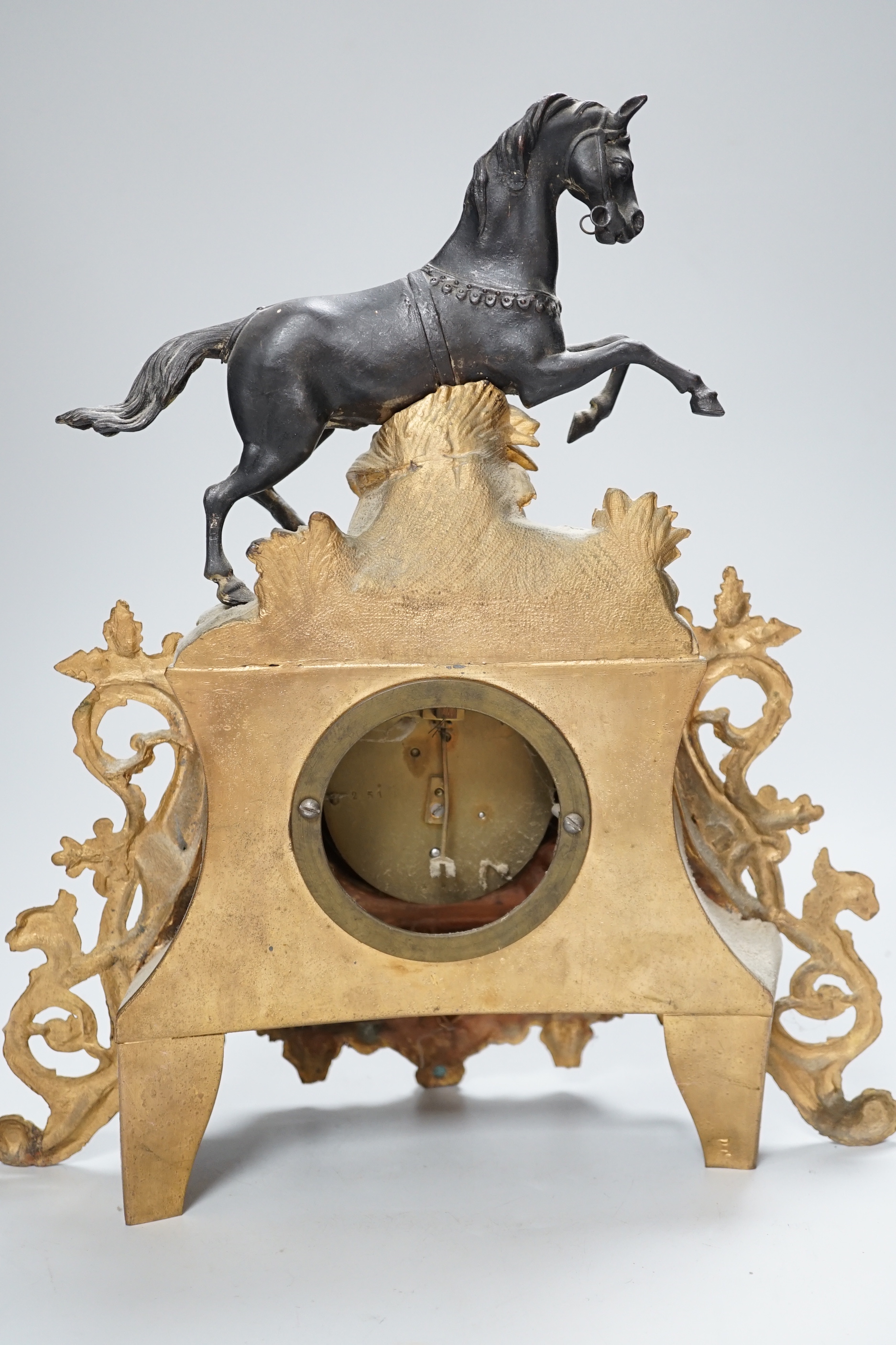 A late 19th century French gilt metal horse mounted clock, 35cm